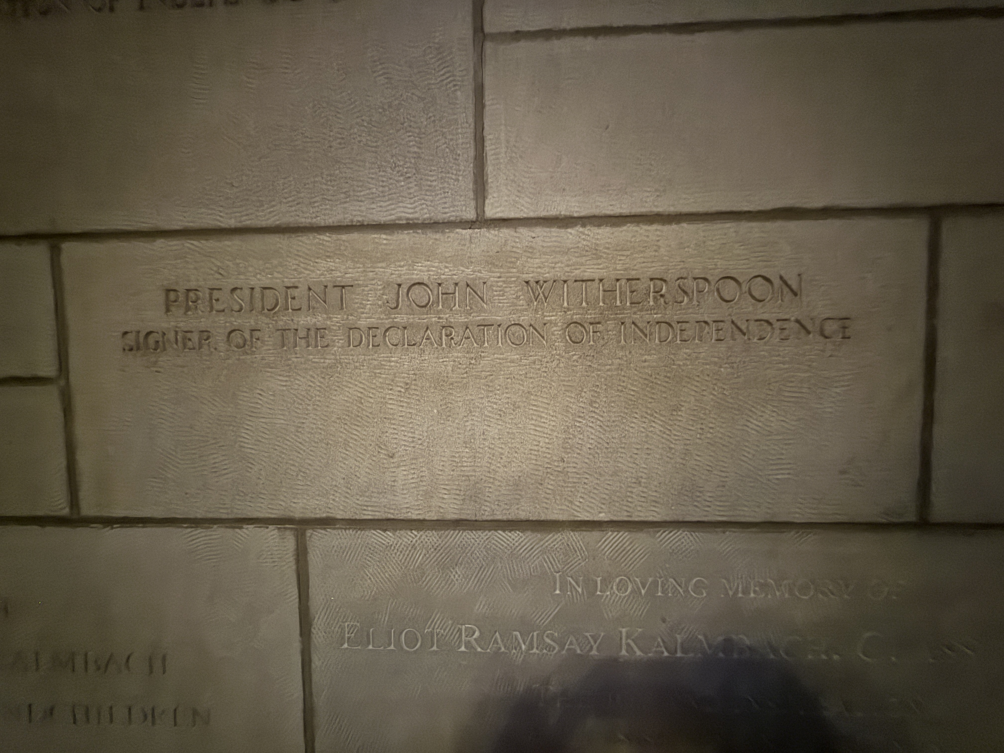 Stone wall inscription naming President John Witherspoon as a signer of the Declaration of Independence